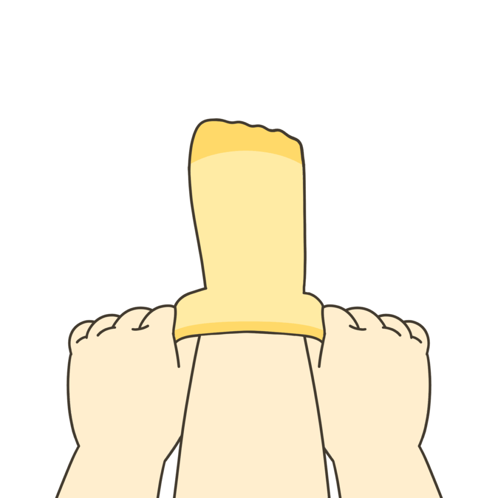 くつしたをふくらはぎあたりまでしっかり引き上げている様子